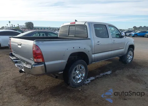 2014 Toyota Tacoma Base V6 z USA, uszkodzony, nr VIN 3TMLU4EN9EM143255